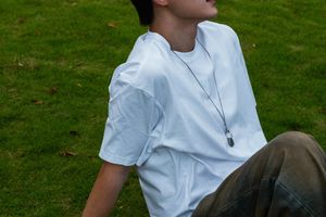 Serene person in meditation, radiating calm.